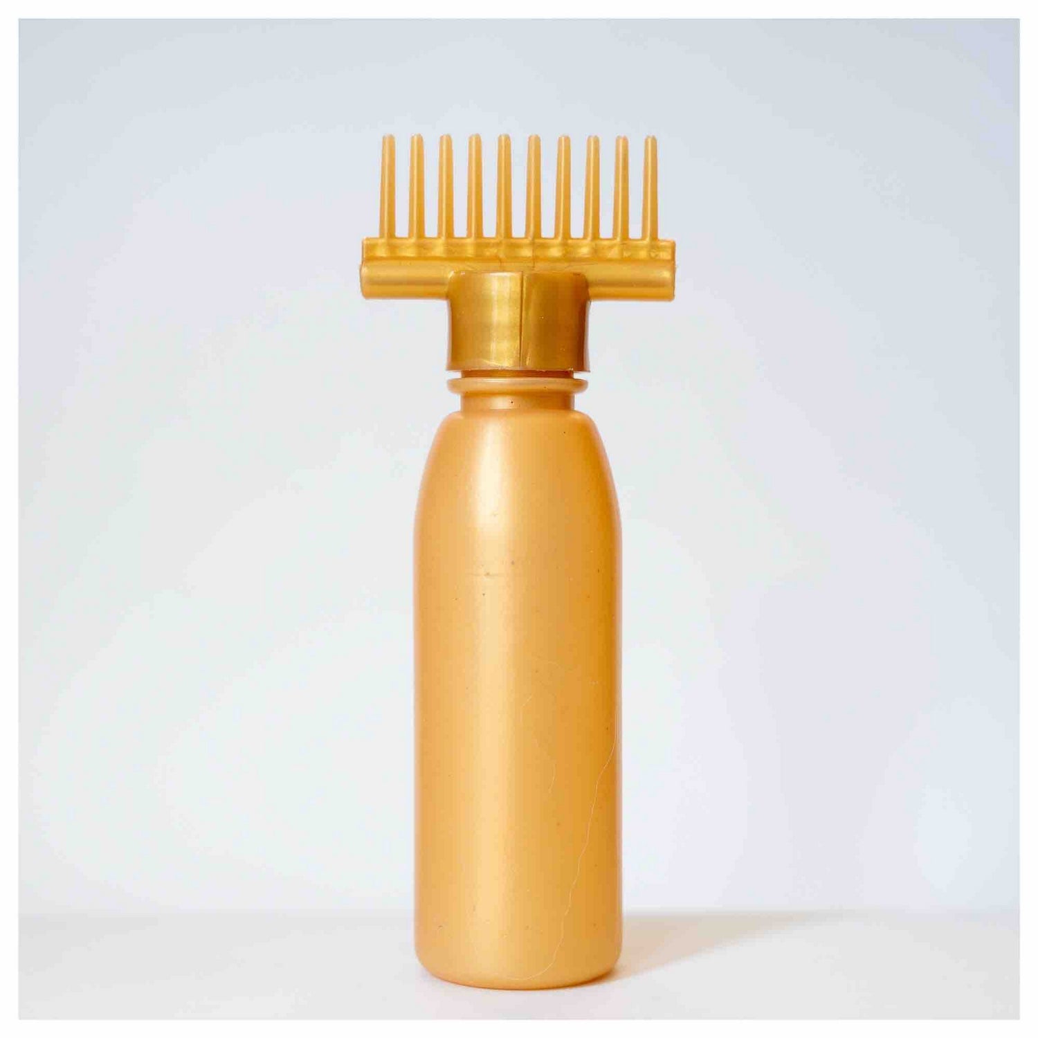 Hair Oil Comb Bottle gold - FlyingCart.pk